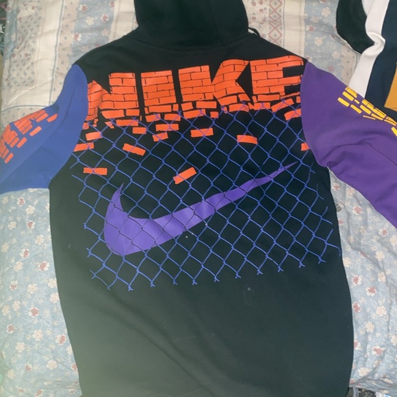 A zip up jacket purple,yellow,orange,blue, and black - Picture 2 of 5